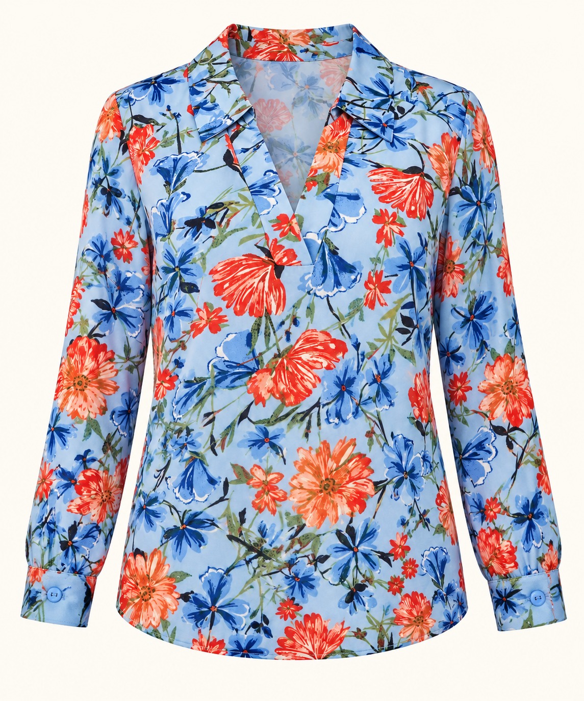 Blusa celeste de flores naranjas y azules